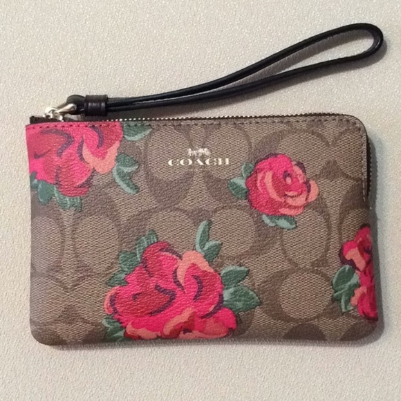 Coach Handbags - NWT Floral Coach wristlet in signature canvas